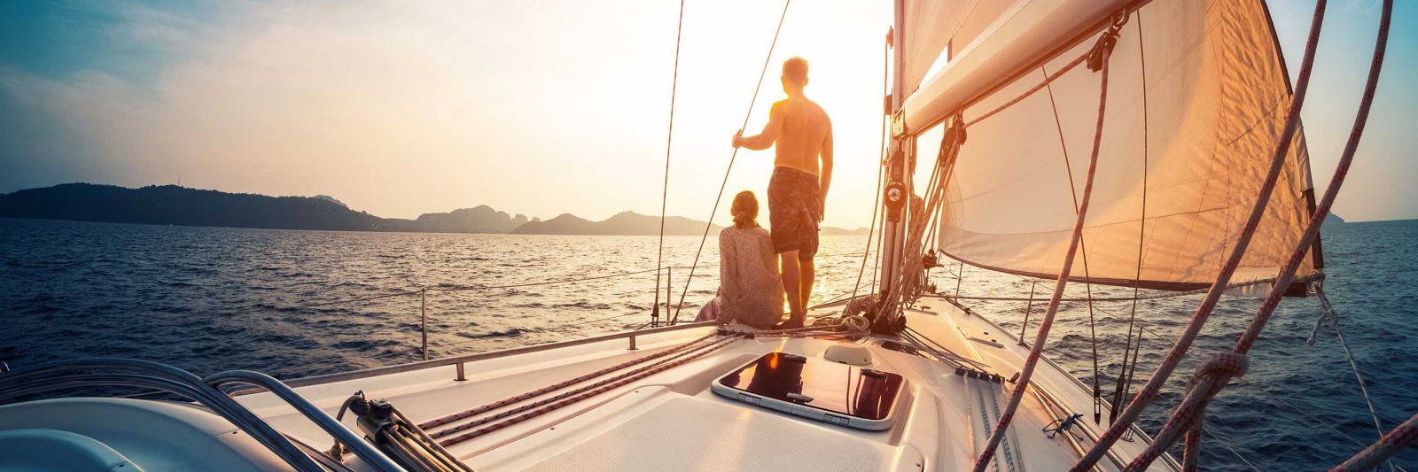 Couple sailing on yacht