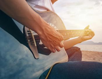 songwriter on beach